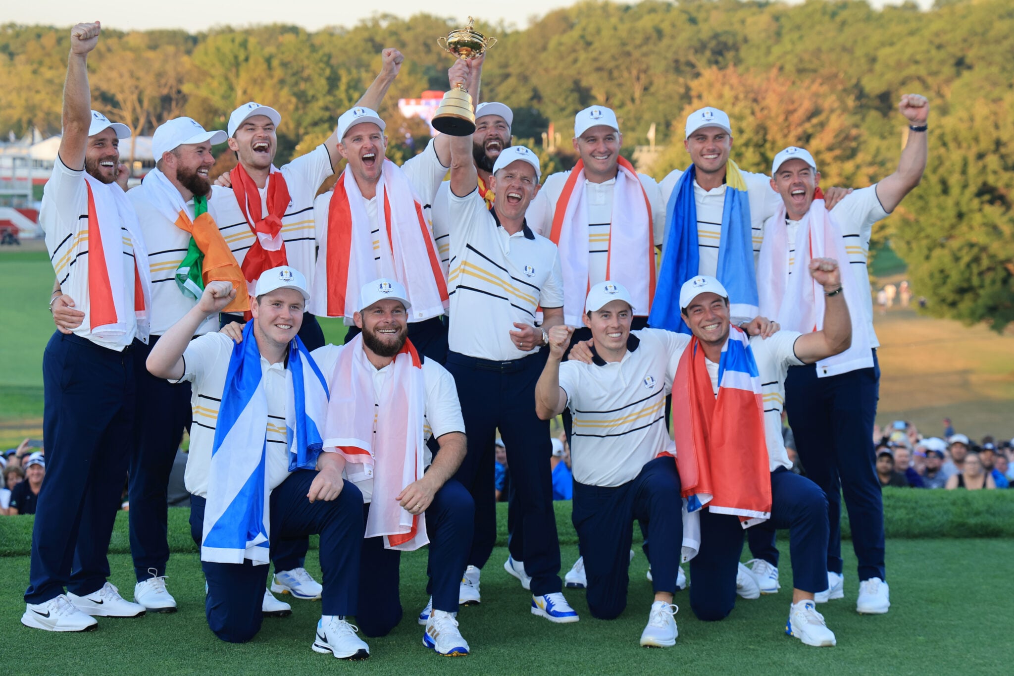 Team Europe hold the Ryder Cup trophy at the 2025 Ryder Cup at Black Course at Bethpage State Park Golf Course | Source: David Cannon/Getty Images